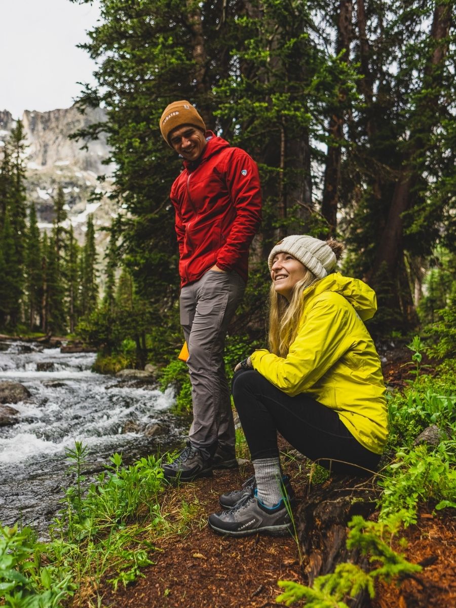adventure couple wearing garmont boots while backpacking in colorado