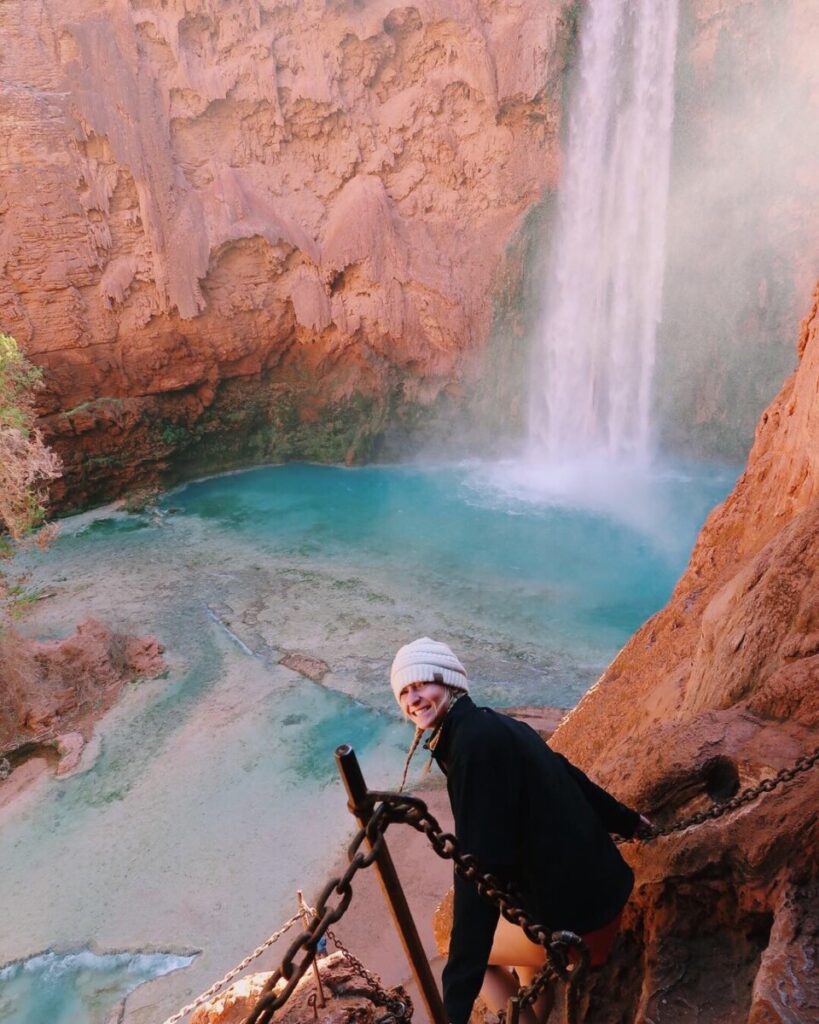 Climbing down the ladders at Mooney Falls