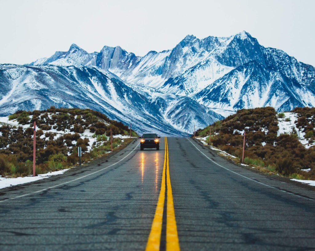 Car driving down a road in Mammoth Lakes, California