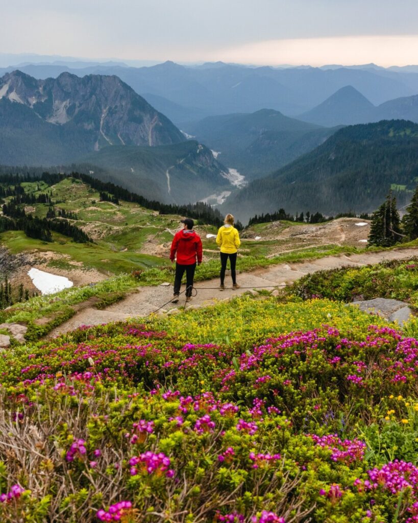 Adventure Couple Hiking the Skyline Trail in Mount Rainier National Park in Washington State