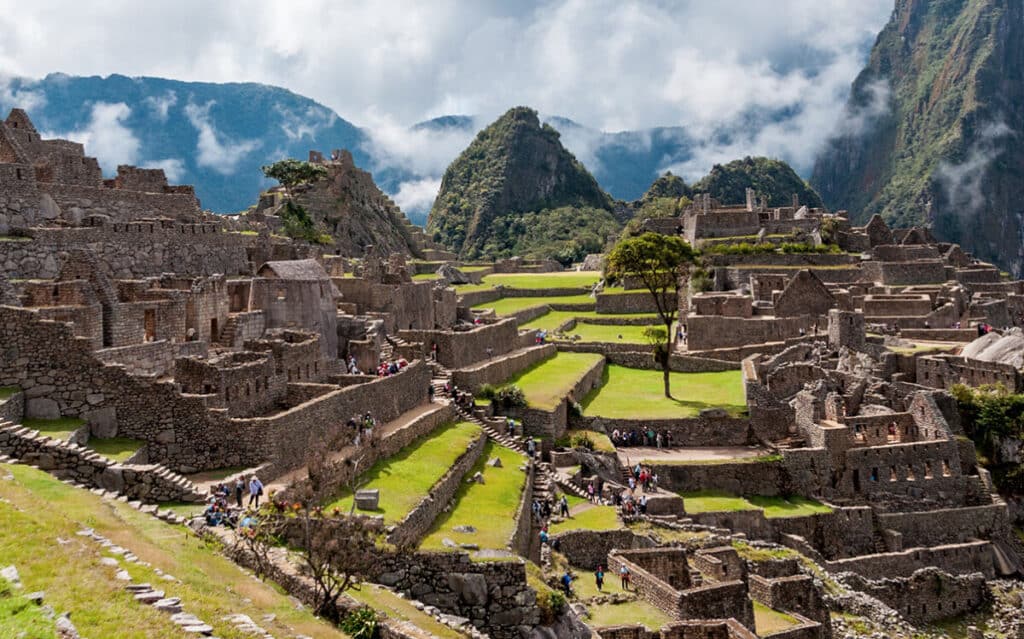 Tourists Exploring Machu Picchu
