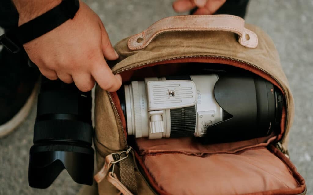 A Valuable Camera Lens in a Backpack