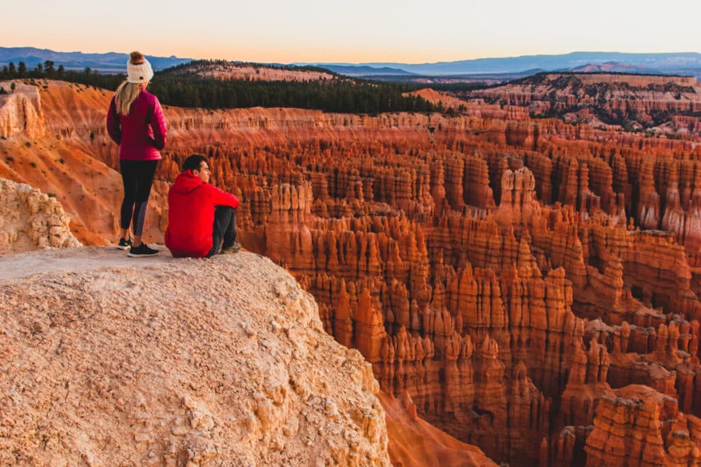 adventure couple hiking in bryce canyon national park utah