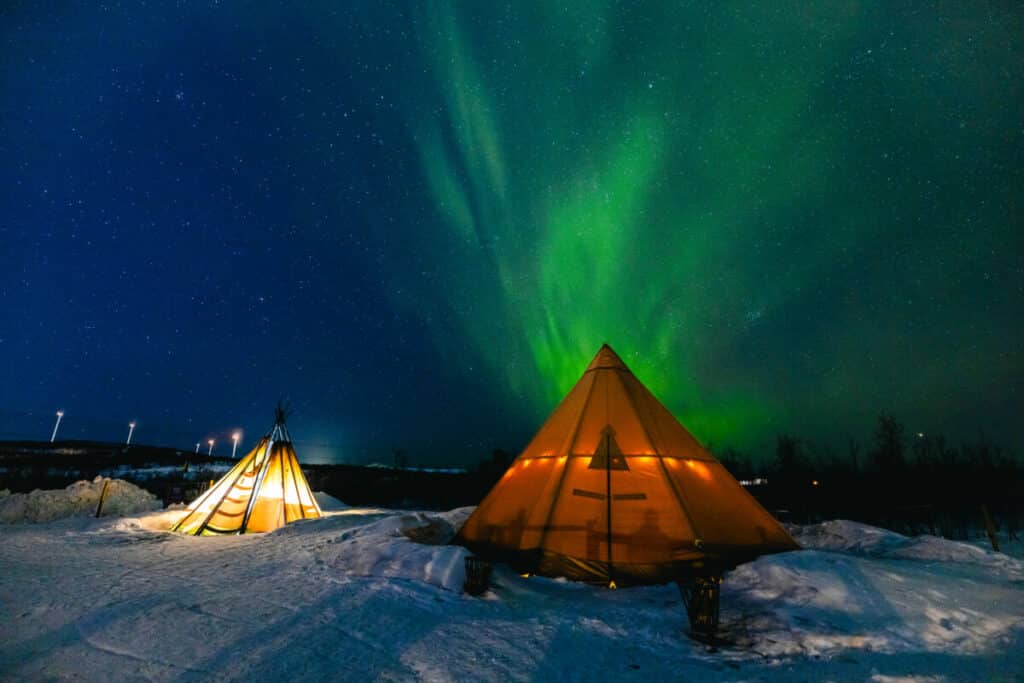 Northern Lights above a Sami tent in Kiruna, Sweden