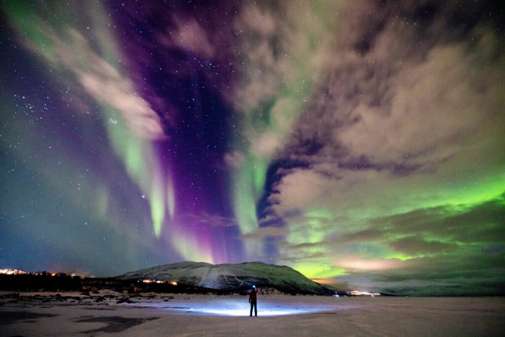 Northern Lights above a frozen lake in Abisko National Park, Sweden