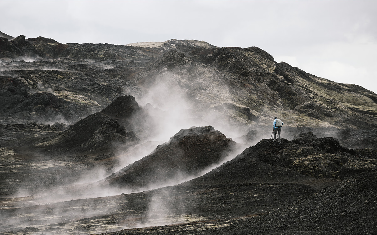 A Hiker in a Volcanic Area in Iceland