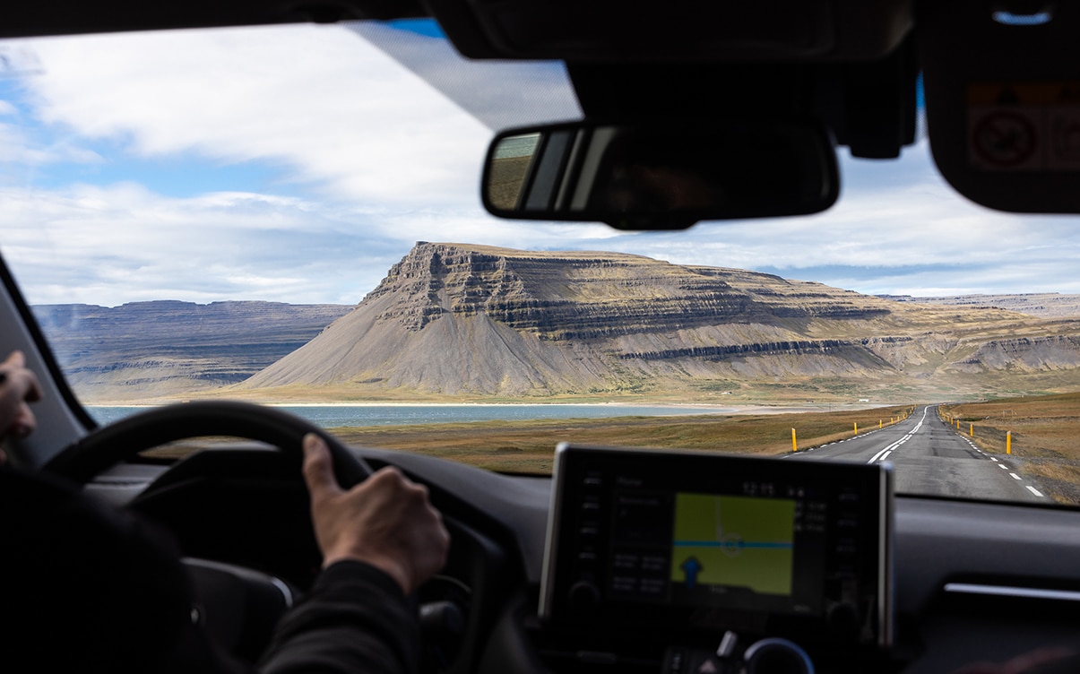 A Person Driving the Iceland Ring Road