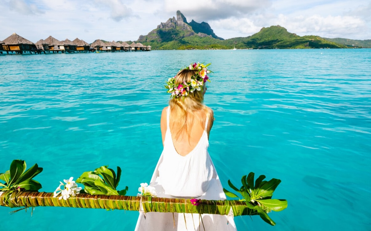 A Woman in a Canoe in Bora Bora