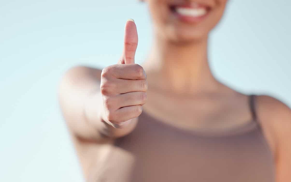 A Woman Giving a Thumbs Up