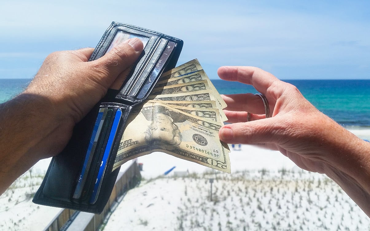 A Person Carrying Cash in Their Wallet