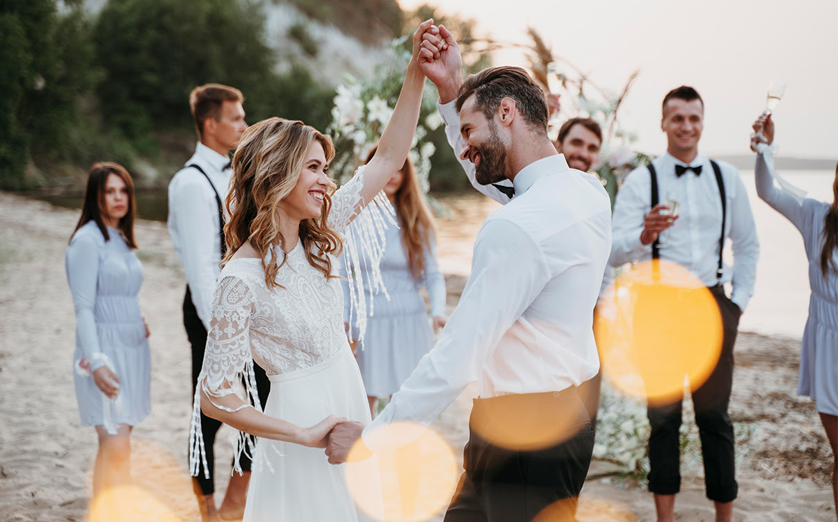A Couple Dancing at a Beach Wedding