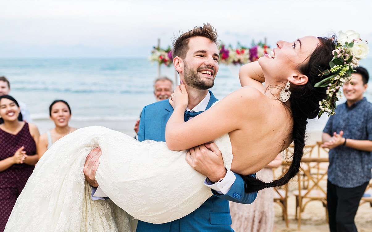A Couple Getting Married on a Beach A Couple Getting Married on a Beach