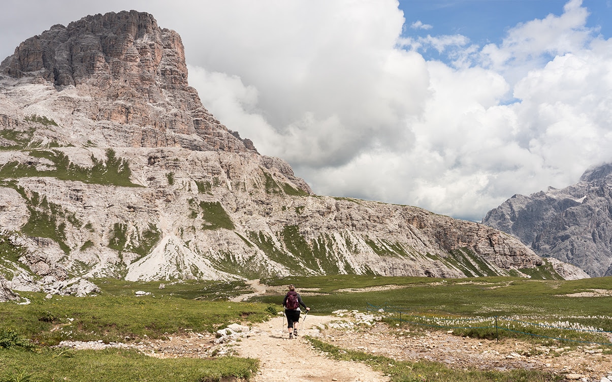 A Person Hiking in the Dolomites