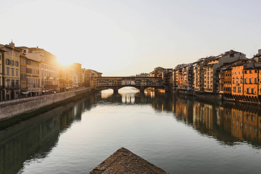 View of the Ponte Vecchio at sunrise from L'alba di Firenze