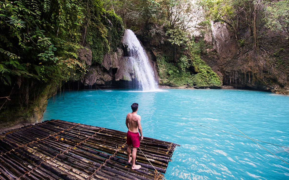 A Man at Kawasan Falls in Cebu