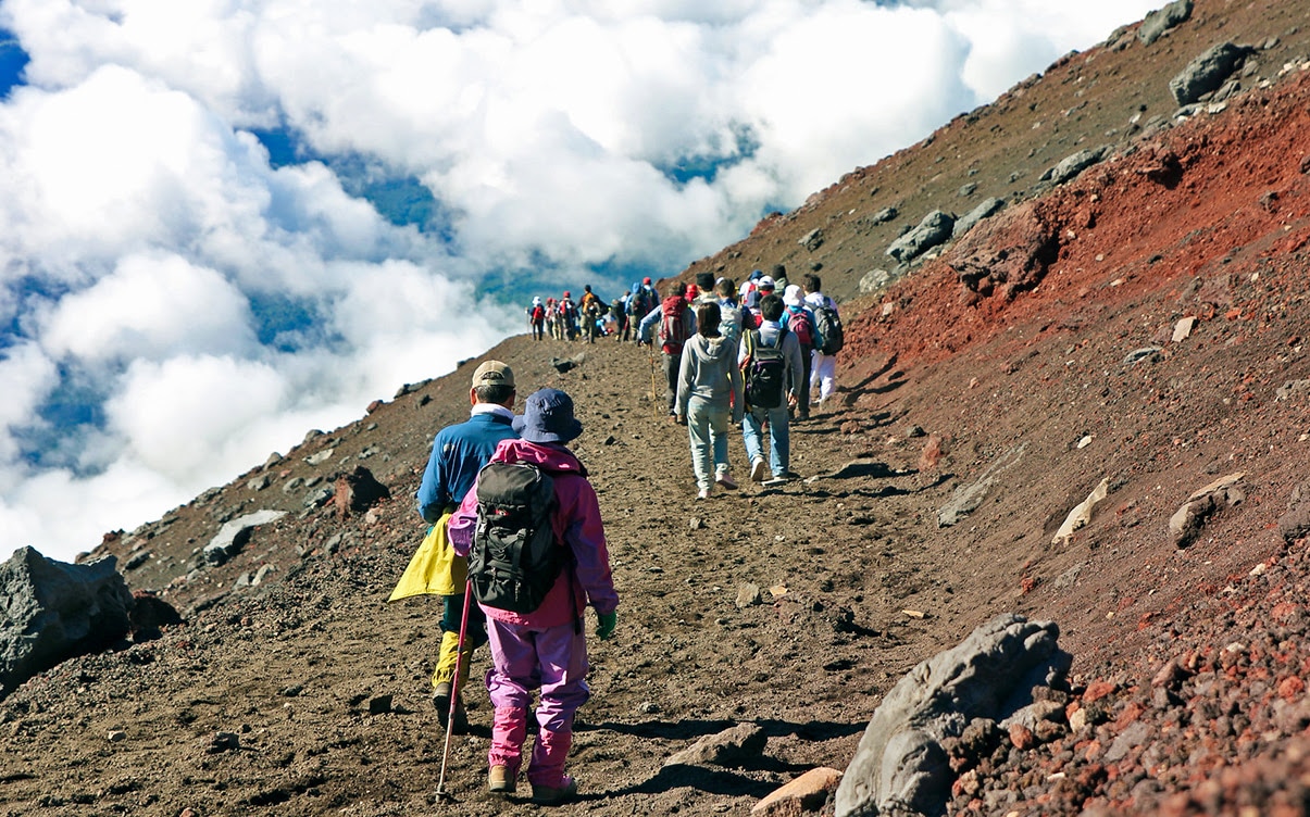 People Climbing Down Mt Fuji