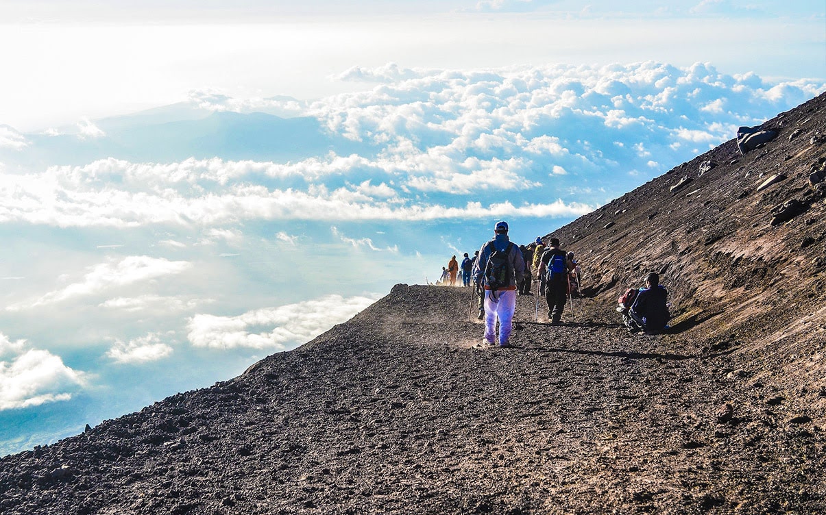 People Hiking on Mt Fuji