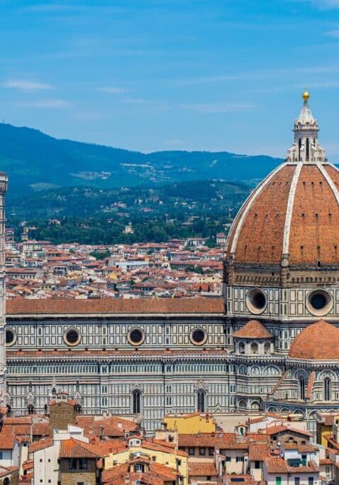 Florence's Cattedrale di Santa Maria del Fiore in full view, taken from the top of adjacent Torre di Arnolfo by the Piazza della Signoria.