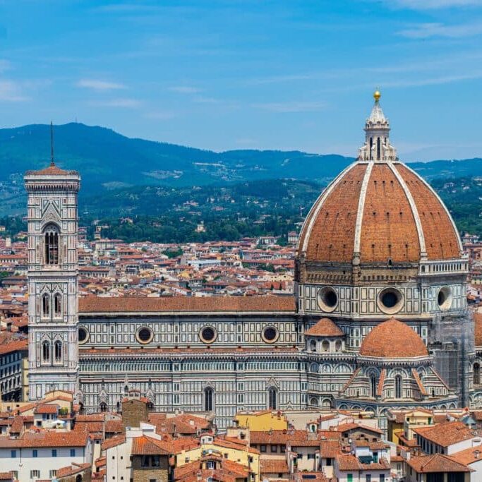 Florence's Cattedrale di Santa Maria del Fiore in full view, taken from the top of adjacent Torre di Arnolfo by the Piazza della Signoria.