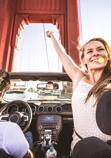 A Couple Driving on the Golden Gate Bridge