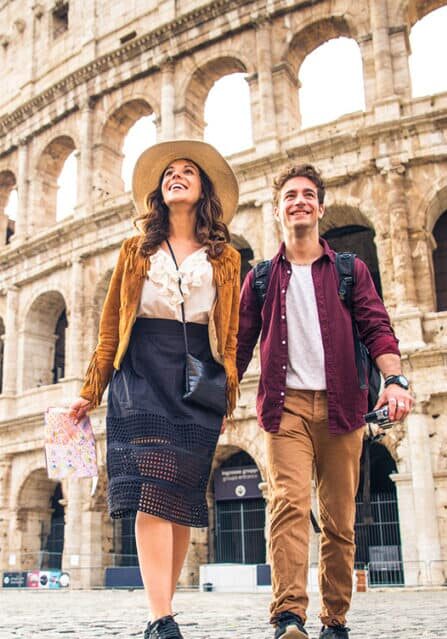 A Couple Walking Outside the Colosseum in Rome