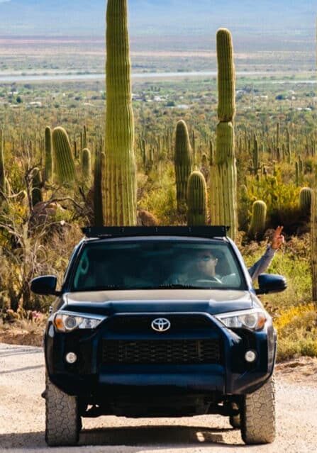 A Person Road Tripping Through a Desert