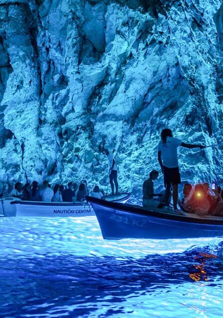 Boats in the Blue Cave in Croatia