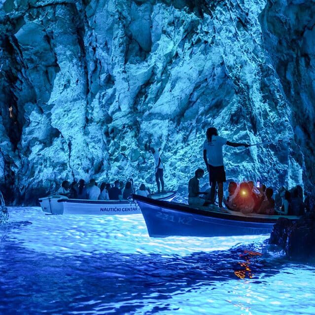 Boats in the Blue Cave in Croatia