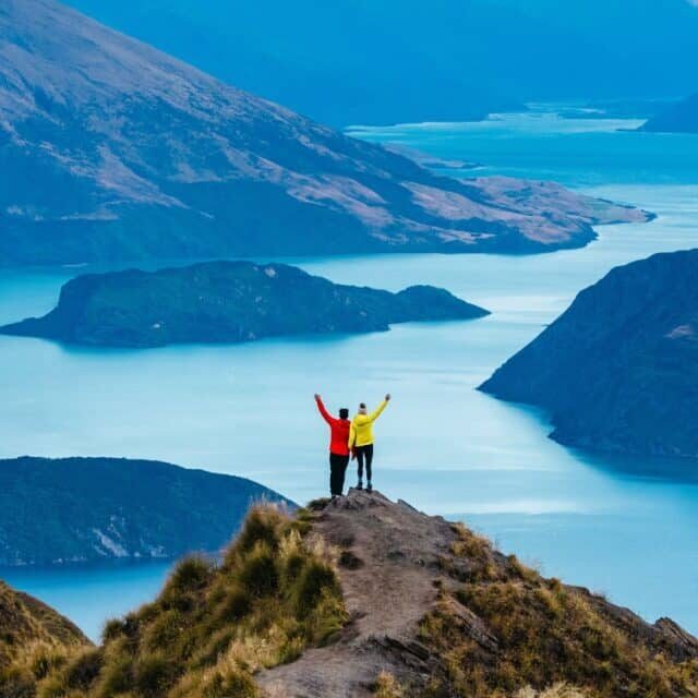Couple on Roys Peak in Wanaka New Zealand South Island